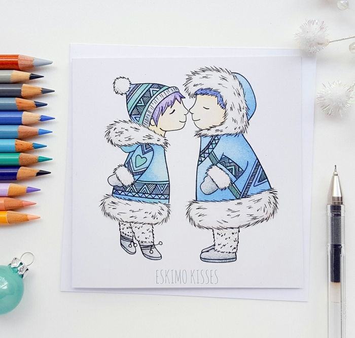 Søt julekort med to eskimoer, Eskimo kyss, berøring av nesetips, fargestifter og blå bauble