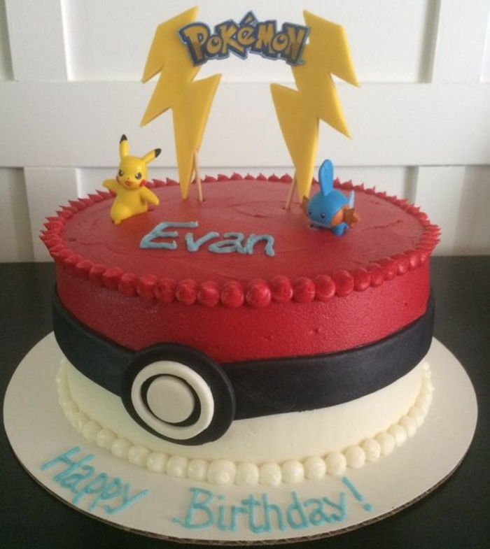 Idéia para uma torta de pokemon vermelho com dois pequenos seres pokemon diferentes, um manchete amarelo e manchetes amarelas