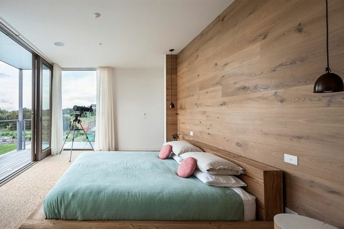yatak odası tasarımı-fikirleri-ahşap-duvara ve modern yataklı