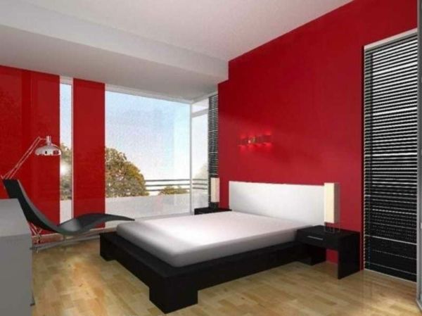 sypialnia z białym łóżkiem i czerwonymi ścianami