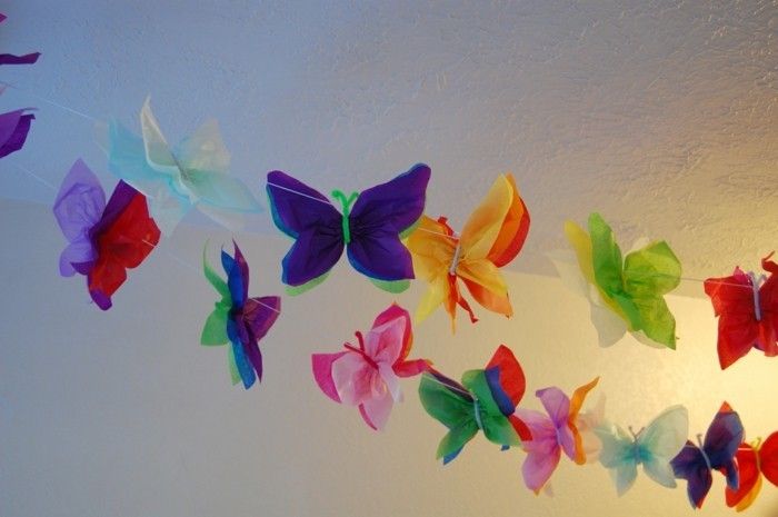 butterfly-Tinker-många färgstarka-modeller-on-the-wall