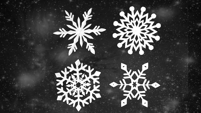 Drotárska dekorácia okien - tri šablóny rôznych snehových vločiek, hviezdy v pozadí