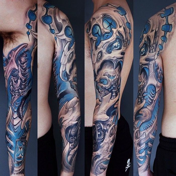 Tatoeages bovenarm, grote gekleurde driedimensionale biomechanische tatoeage