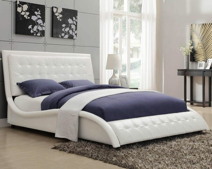 Çok geniş model-yatak ile-bin-beyaz-desenli-modern bir yatak odalı