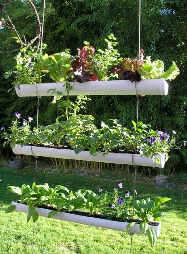 namuose pagaminta sodo apdaila - trys aukštai - su augalais - kūrybinės idėjos