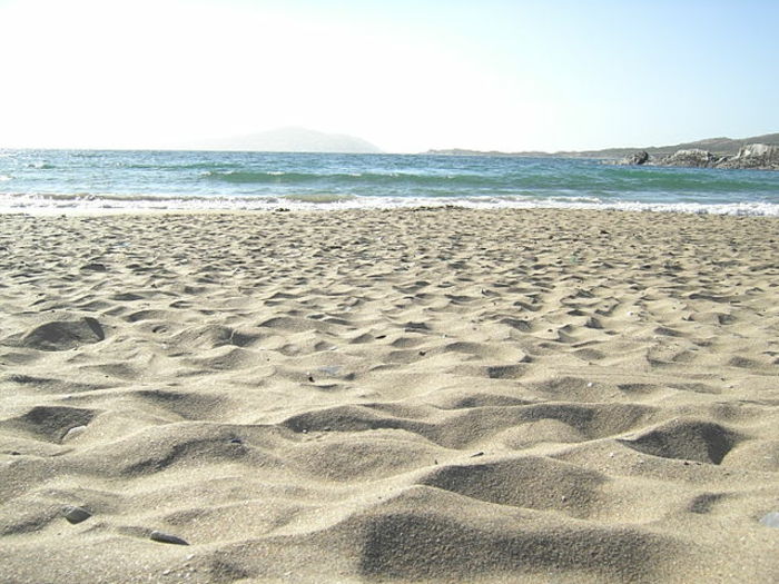 zon-en-strand-zand