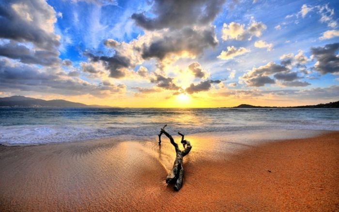 zon-en-strand-vele prachtige cloud