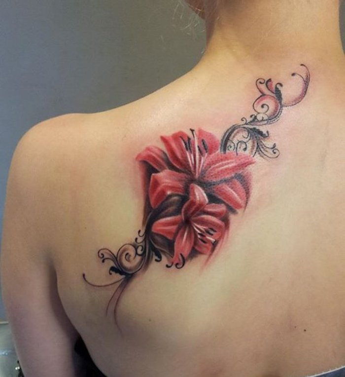 tatuaż kwiat wąs, czerwone lilie w połączeniu z elementami abstrakcyjnymi