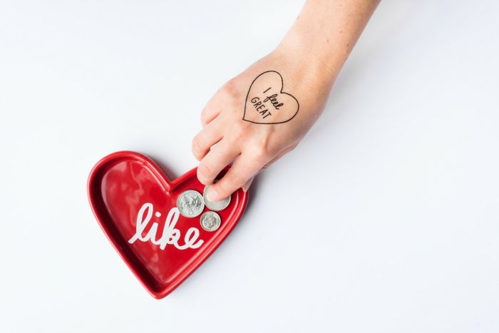 motivi del tatuaggio un tatuaggio, ti ricordiamo che ti senti bene e sei amato cuore