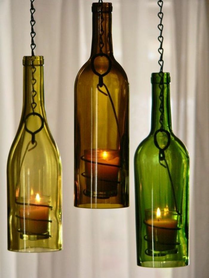 upcycling idéer - dekorationer gjorda av vinflaskor med ljus
