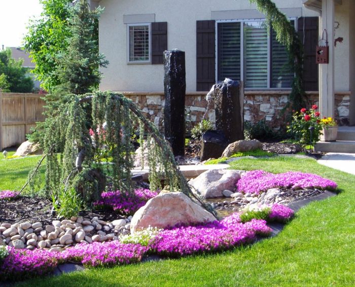 flori roz, iaz, salcie plâns, grădină de rock - curte modernă din față