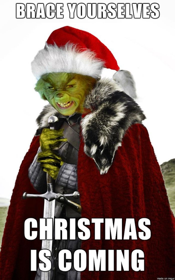 Julfoton - Grinch bär ett svärd med orden Ned Stark byttes till jul