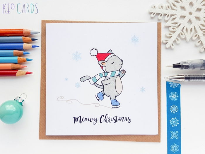 Roztomilá vianočná karta pre deti, mačiatko so santa klobúkom a korčule na korčule