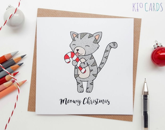Roztomilá vianočná karta pre deti, mačiatko s cukrovej trstinou, malé vianočné stromčeky