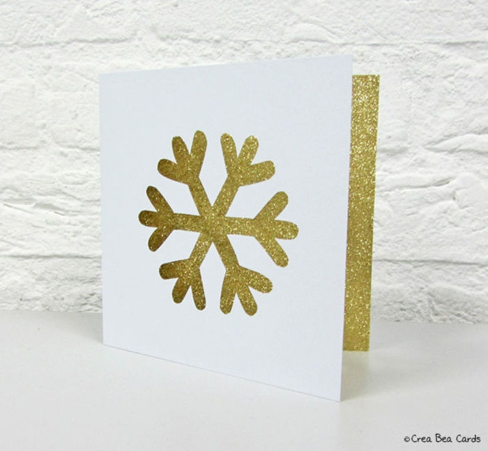 Vytvorte si vianočnú kartu sami, vystrihnite snehovú vločku frézou, striekajte s leskom