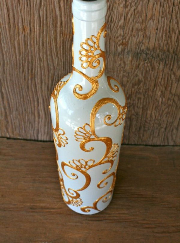 vit flaska och guld-henna dekoration handmålad
