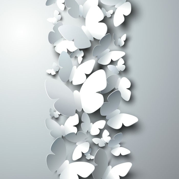krásne biele motýle z papiera
