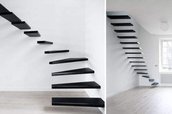 hvit vegg og fritt flytende trapp i svart